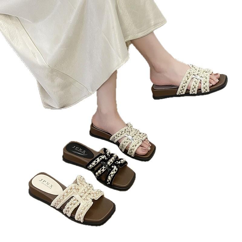 Thick-soled cool slippers for women's summer wear 2025 new beautiful pearl one-word drag with skirt vacation style beach sandals
