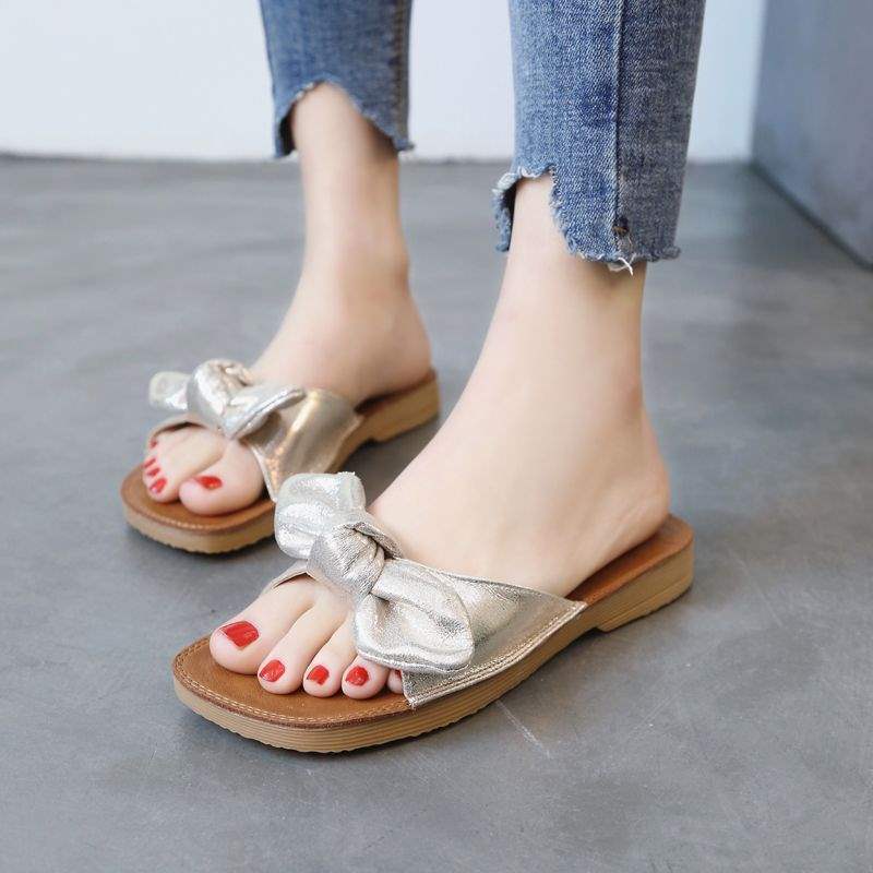 

2025 summer new thick-soled cool slippers flat-soled bow one-word drag sweet versatile beach shoes women s shoes 40