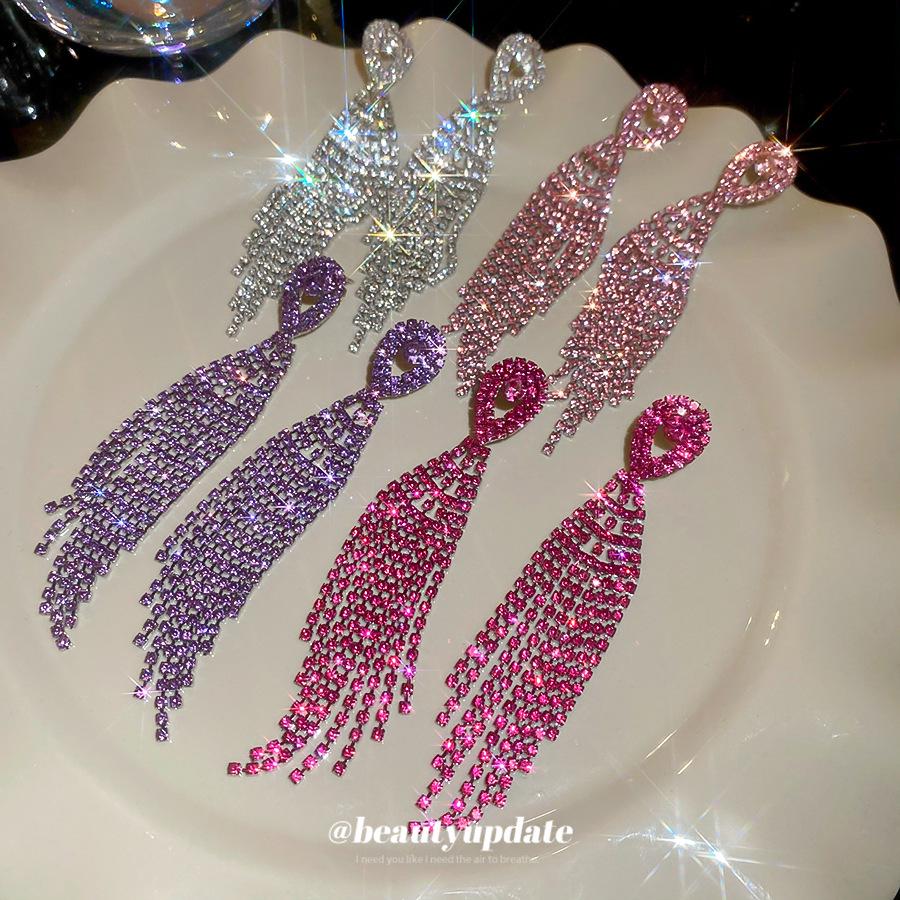 Silver Needle Court-Style Rhinestone Tassel Earrings: Elegant, High-End Light Luxury with a Fashionable, Exaggerated Design.