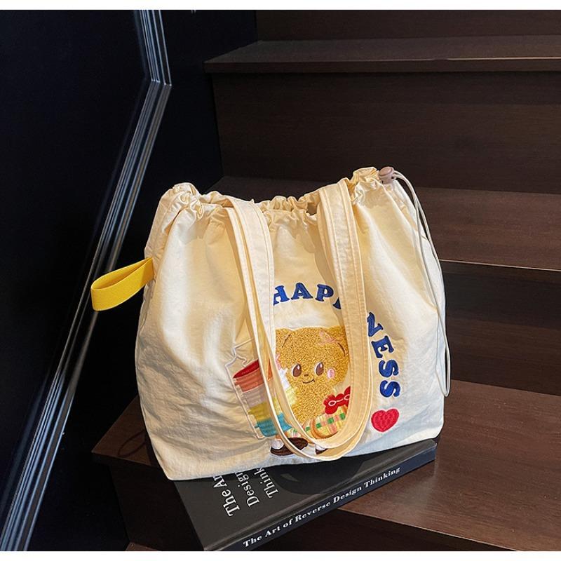 The new School of Arts and Art style is simple and large-capacity tote bag, and women's tide is popular. Versatile commuter shoulder bag.