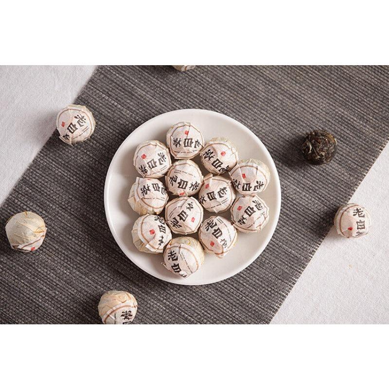 Tè Yunnan Pu'er Fuding Processo del tè bianco Peonia bianca Vecchio tè bianco Perla del drago