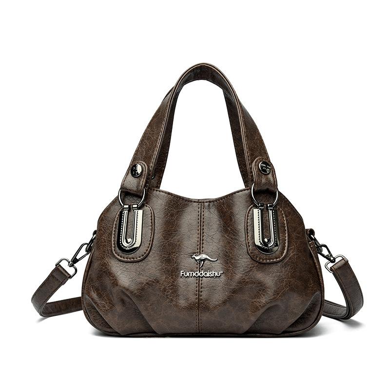 

Мягкая кожа темперамент пряжка заклепка новая на плечо через плечо повседневная нишевая женская сумка сумочка коричневый