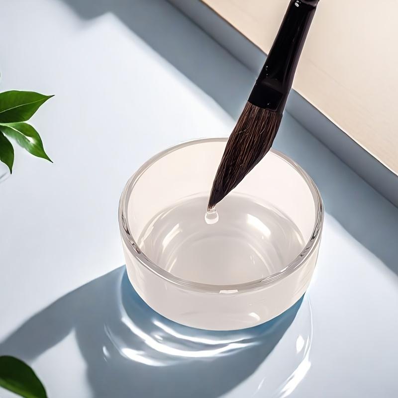 A Set of 4 Watercolor Brushes Designed for Professional Artists, Featuring Chisel Handles And an Ergonomic Ferrule Design