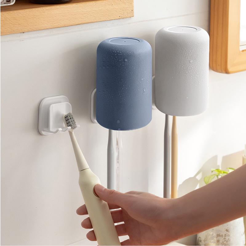 Japanese-Style Wall-Mounted Toothbrush and Mouthwash Cup Holder - Punch-Free Electric Toothbrush Storage and Drain Rack.