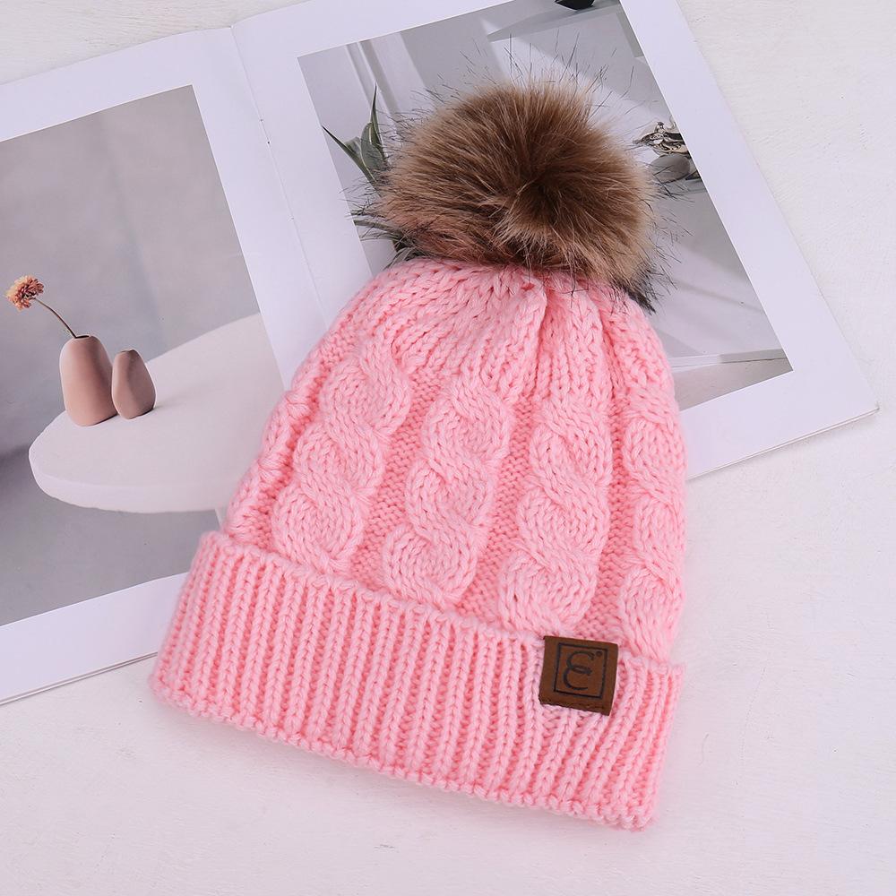 European and American fashion solid color simple warm comfortable knitted hat hairball decoration windproof face small wool hat