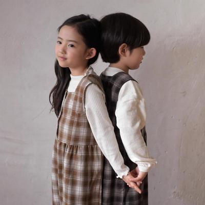 Tuta a quadri coreana Primavera 2026 per ragazzi e ragazze: Tuta Romper alla Moda Larga