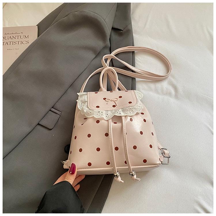 Schoolbag1011 spring new lace women's backpack sweet sister Korean polka dot casual personality foreign style small backpack