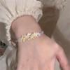 [] Osmanthus Chinesische Blume Armband Frühling und Sommer Neu Hochwertiges Design Luxus Vielseitig Freundin Geschenk Schmuck