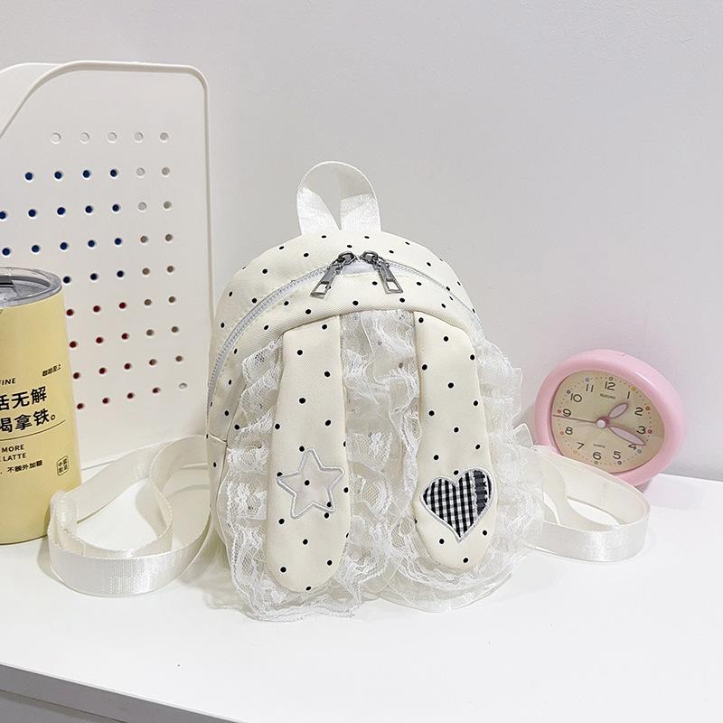 Schoolbag Korean version of sweet girl polka dot lace backpack new lop-eared rabbit trend high value travel foreign style backpack