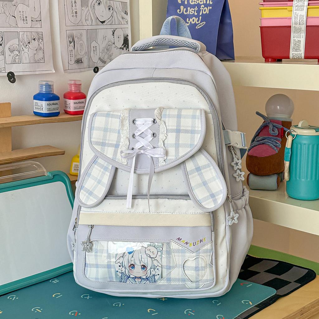Mochila japonesa de dos dimensiones transparente bolsa para el dolor de alto valor estilo ins universitario a cuadros mochila para estudiante de secundaria con múltiples compartimentos
