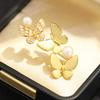 Light luxury, high-end sense, three butterflies, gold brushed craft brooch, slightly inlaid with zircon, freshwater pearl, insect pin, female.