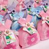 Holiday gift bag knitted bag Muse festival cute flowers to send staff handbag Korean version style gift knitted bag