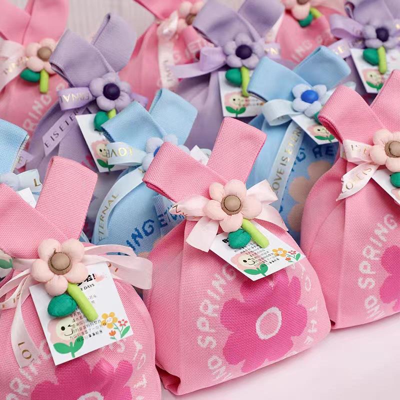 Holiday gift bag knitted bag Muse festival cute flowers to send staff handbag Korean version style gift knitted bag