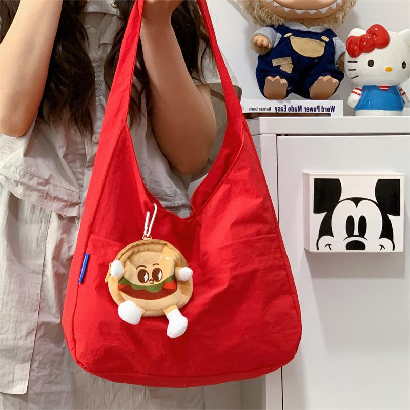 Japon et Corée du Sud sac fourre-tout couleur unie style décontracté pour femme sac à bandoulière polyvalent décontracté pour les trajets quotidiens grande capacité sac pour étudiants cours soutien scolaire