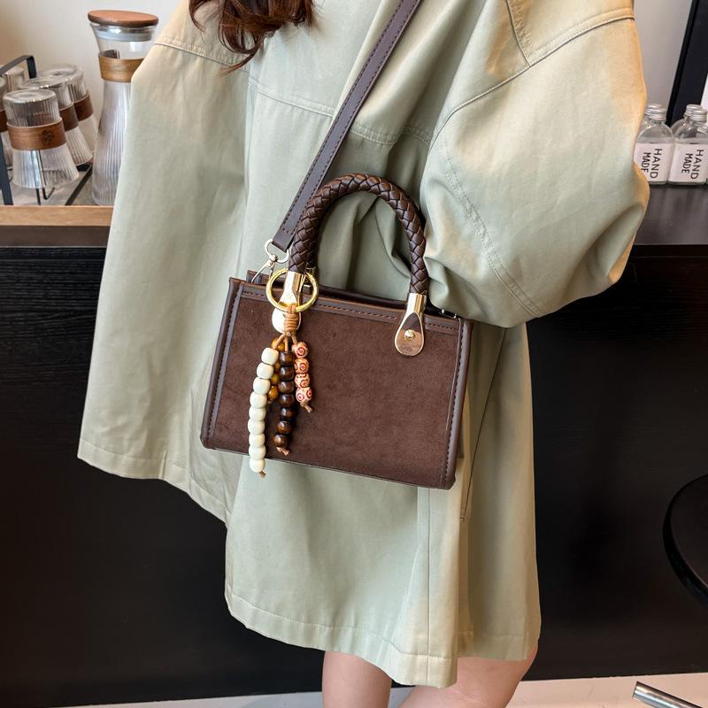 Niche design small bag female leopard print 2025 new Japanese and Korean fashion shoulder bag woven portable messenger small square bag