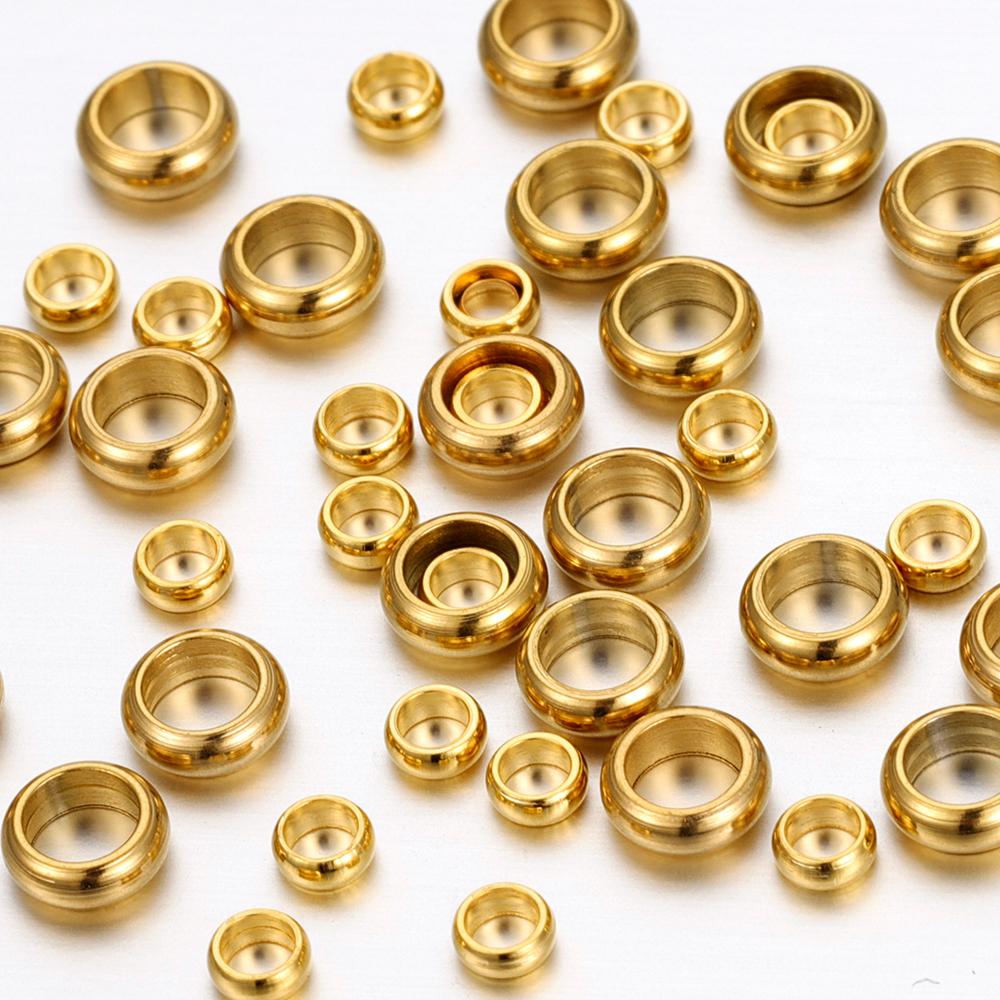 50 stuks Goudkleurig Roestvrij Staal Rond Stopper Spacer Kralen Krimp Eindkralen voor DIY Ketting Sieraden Maken Benodigdheden Groothandel