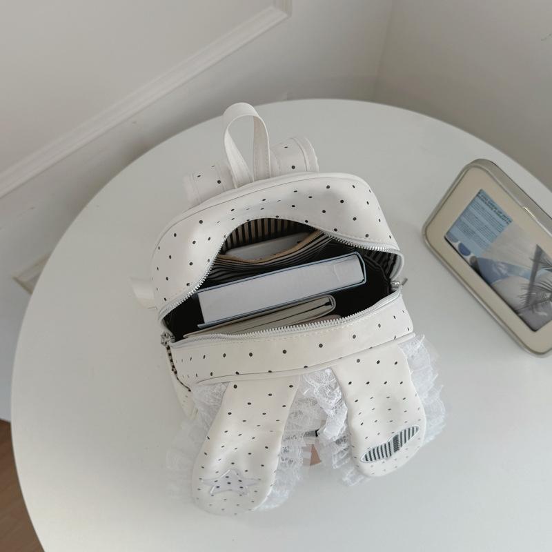 Schoolbag new cute cute cute polka dot lace rabbit ears backpack women's 1011 commuting large-capacity student schoolbag