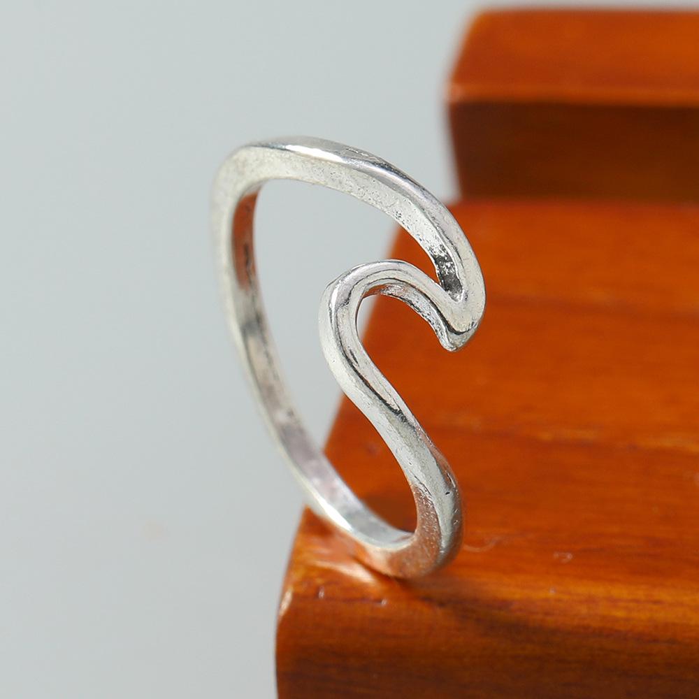 Popular Women's Herringbone Wave Bird Head Laser-Cut Finger Ring
