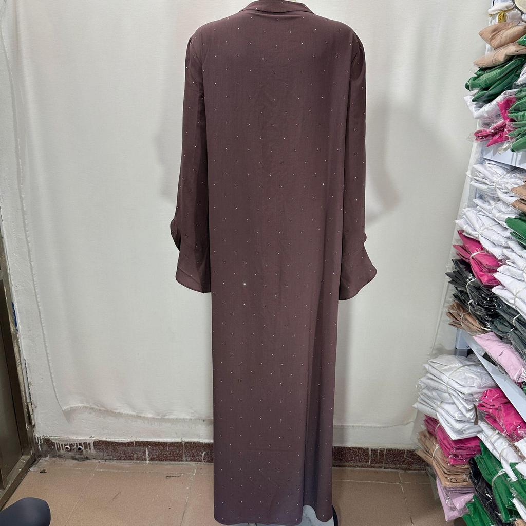 Glitzerndes Langarmkleid mit Rundhalsausschnitt und Bindedetail am Rücken