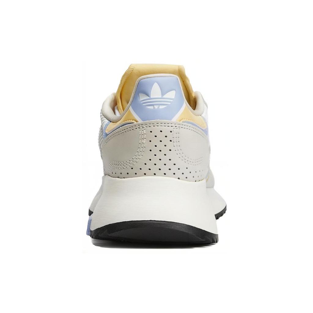 adidas Retropy F2 Białe Niebieski Świt Damskie Sneakersy Rdzenna Biel Prawie Żółty HQ1988