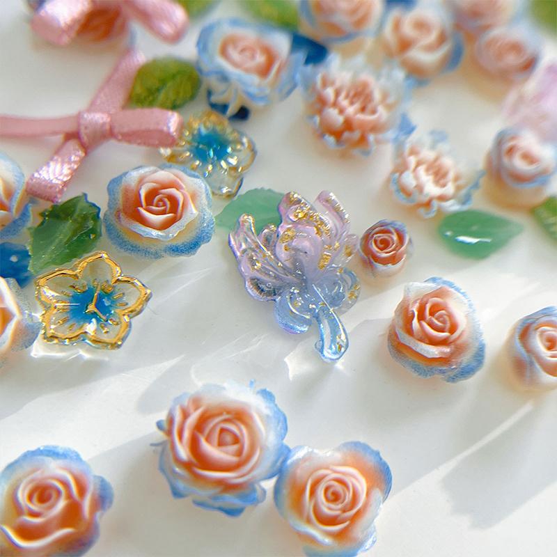 100Pcs Diy Nail Art Decor 3D Blue Pink Roses Garden Nail Drill Mixed Pearl Fabric Butterfly Knot Leaf Manicure Diamond Accessory