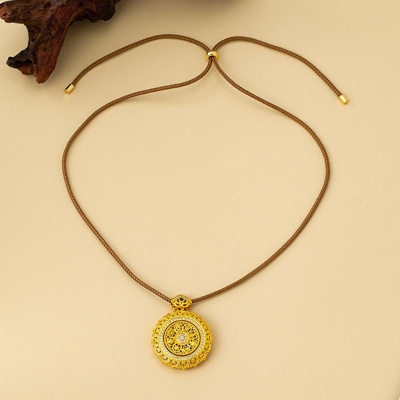 New Chinese sand gold hollow out time comes and goes compass pendant woven rope necklace women's fashion temperament rotating sweater chain
