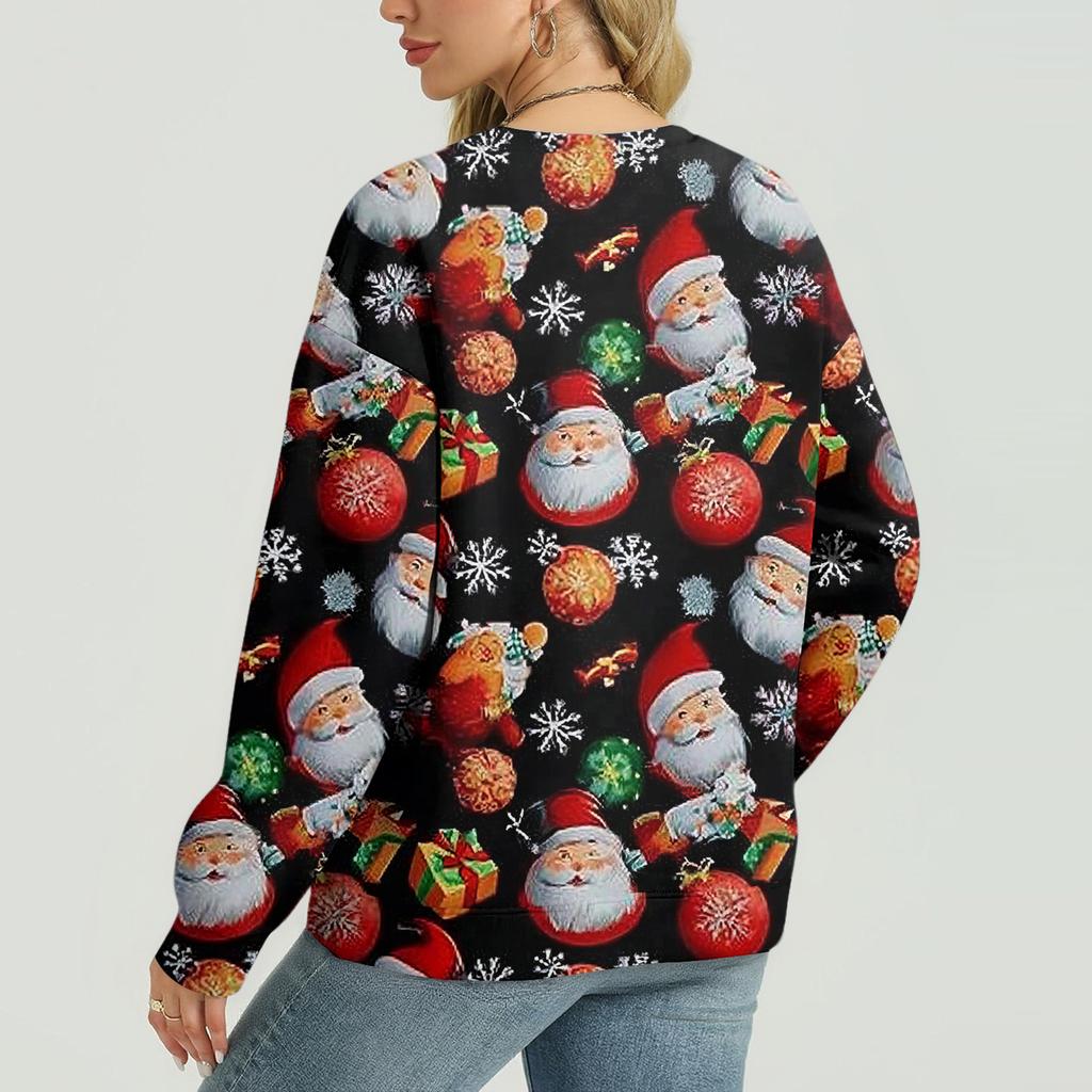 Damtopp med långärmad jultryck och avslappnad design