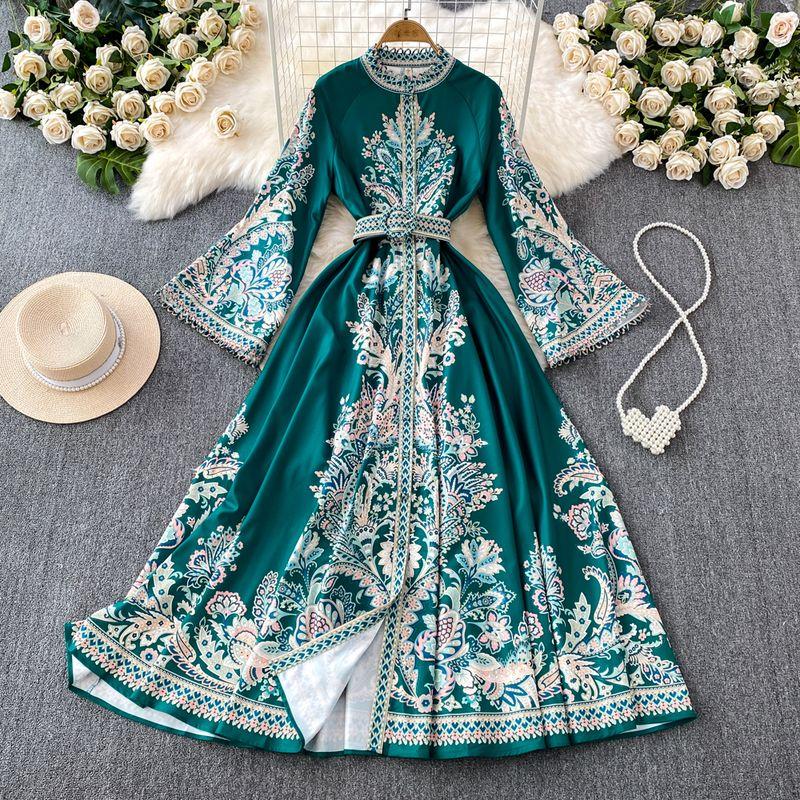 

Весенняя одежда Новое поступление Ретро принт Воротник-стойка Расклешенные рукава Платье Женское Однобортное Большой подол Асимметричная Плиссированная Длинная юбка Peacock Green M