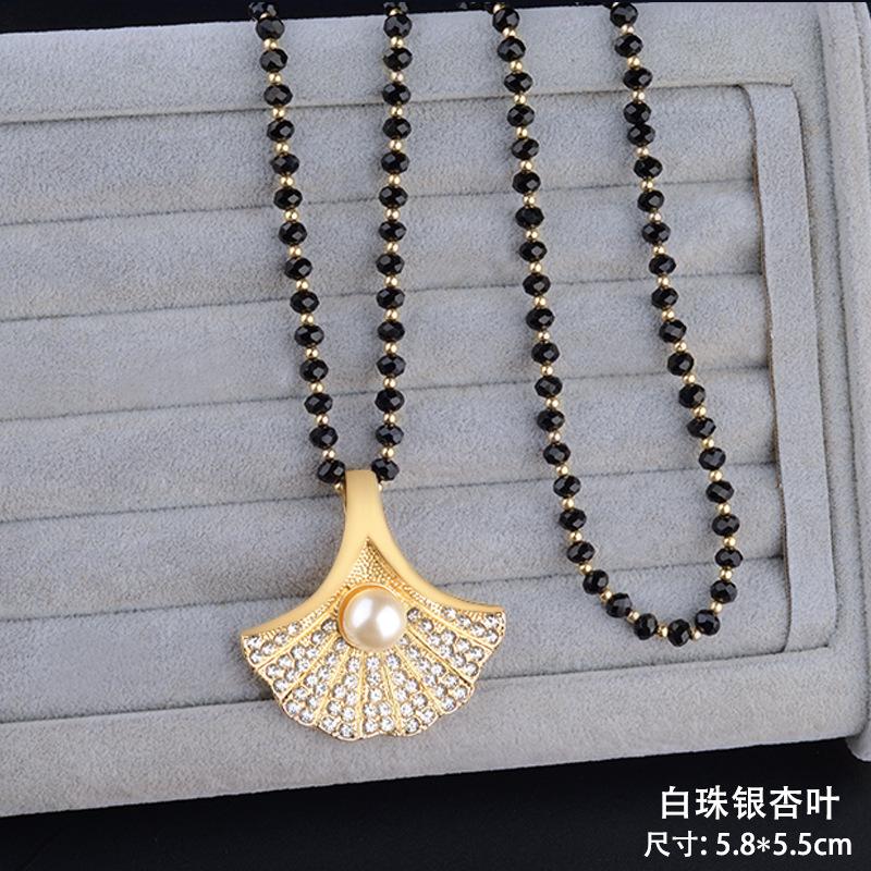 High-end sweater chain atmospheric versatile niche design fashion necklace women s autumn and winter exquisite atmospheric opal pendant