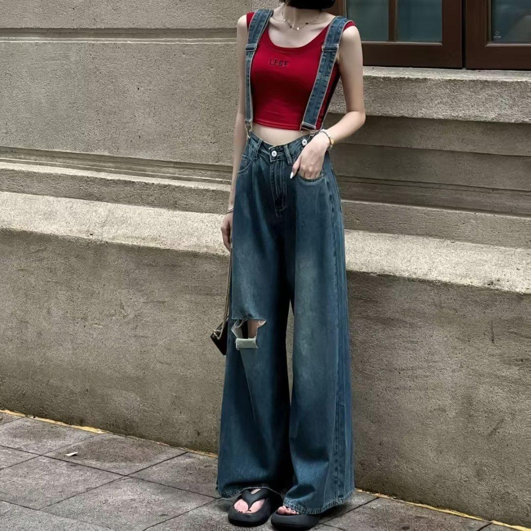 

Женский джинсовый комбинезон с высокой талией и широкими штанинами — свободный, длиной до пола, с рваными краями, облегающий летний крой Medium синий/джинсовый