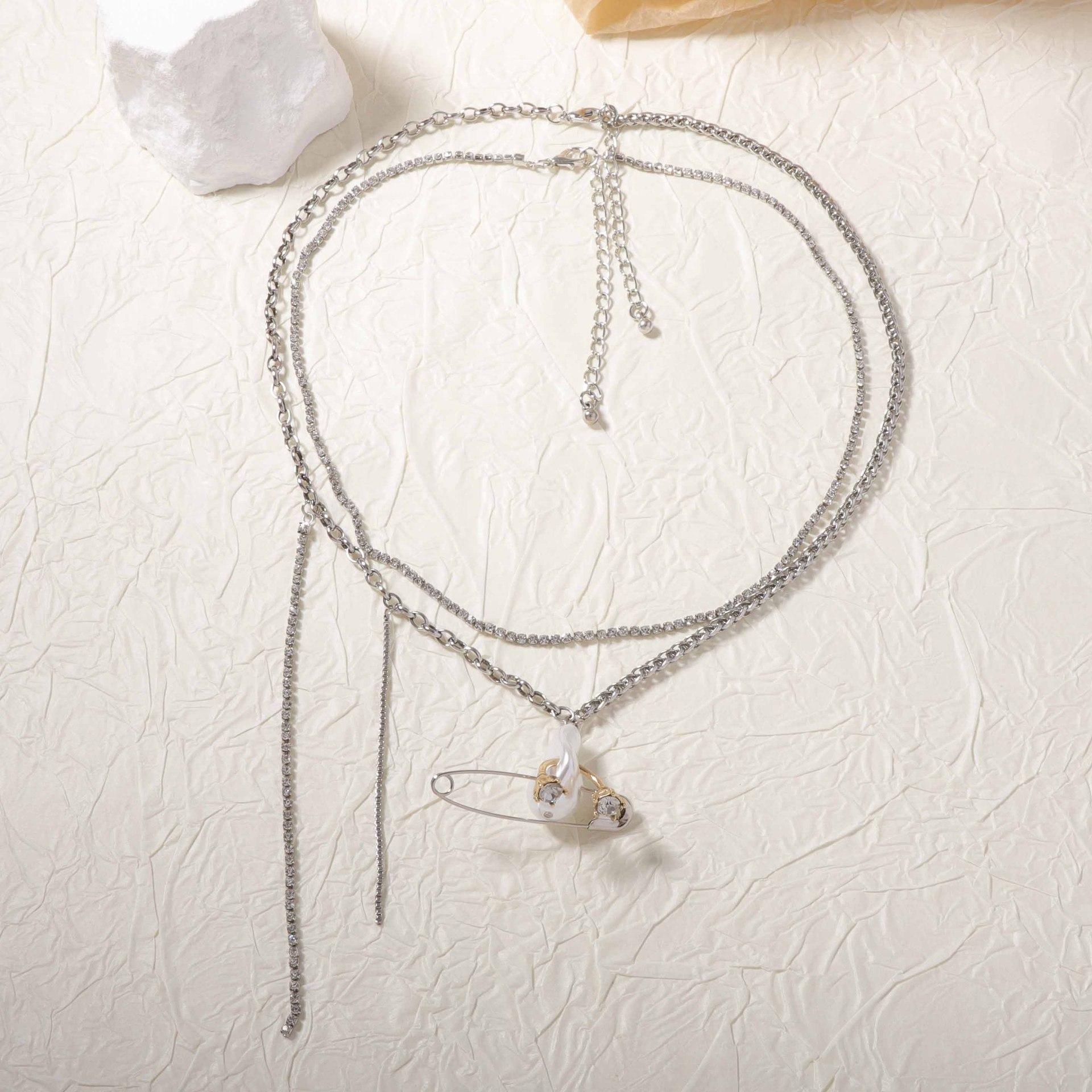 Creative design sense asymmetrical splicing chain inlaid zircon imitation pearl unique pin pendant women s necklace