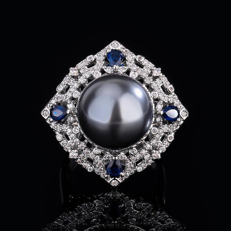 

Ювелирные изделия Медное основание с золотым покрытием Инкрустированный перламутром Имитация сапфирового цвета Бриллиантовая оправа Темпераментный серый набор бусин