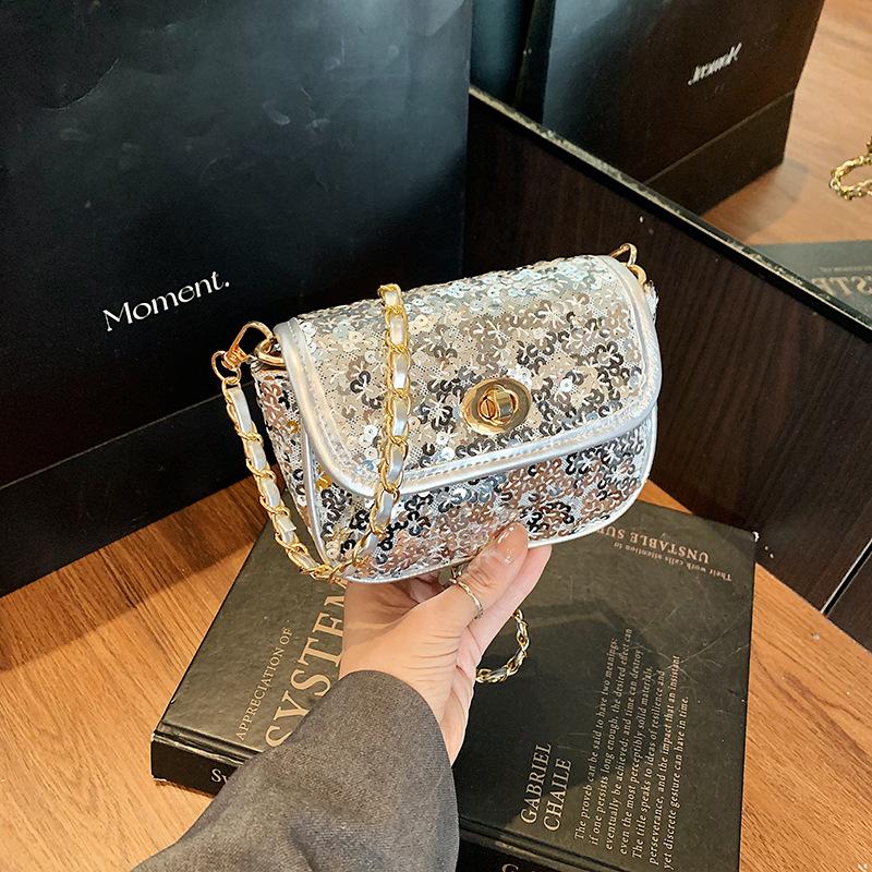 

Summer high-end commuter mini bag mobile phone messenger bag women s new niche sequined chain bag срібний