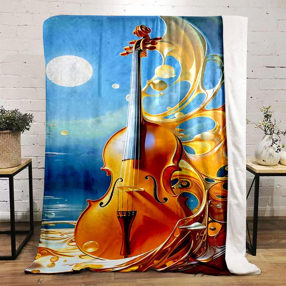 Eine Violine, umgeben von fließenden goldenen Wirbeln unter einem hellen, mondbeschienenen Himmel. Decke für alle Jahreszeiten Mittagspause Überwurf Geschenk