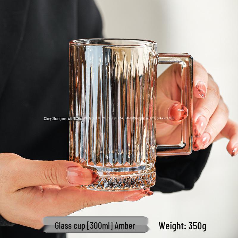 Thickened Glass Cup with Handle: Ideal for Water, Coffee, Tea, or Milk.