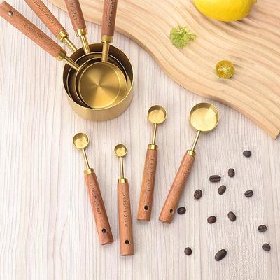 Stainless Steel Gold-Plated Measuring Spoons & Cups with Acacia Wood Handles, Precise Markings, 8-Piece Baking Tool Set.