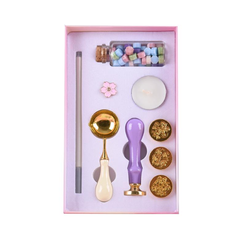 Retro Nine-Piece Wax Seal Stamp Set with Stamps, Wax Granules, Handle, Spoon, and Envelopes