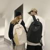 A Male College Student with A Small Simple Large-capacity Computer Backpack