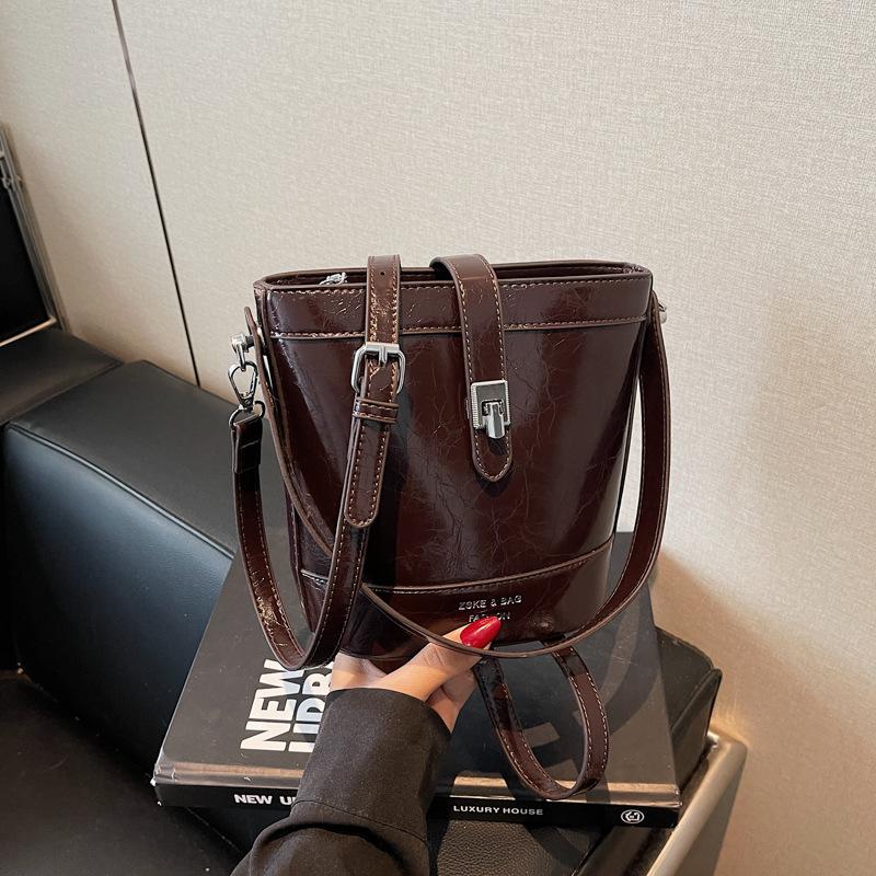 

Ретро светлая роскошная сумка-ведро сумки мода темперамент замок инс сумочка женская сумка для поездок на работу на плечо сумка-мессенджер 19*10*18 темно-коричневого