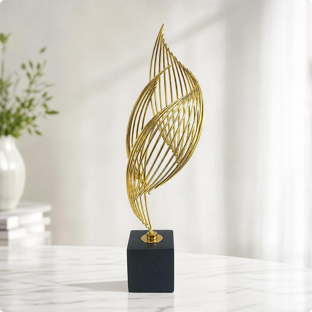 Gold-Tone Metal Sculpture with Black Marble Base Modern Sculptural Accent