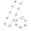 Elegant Four-Leaf Clover Jewelry Set: Titanium Steel Necklace, Earrings, and Bracelet - Light Luxury Design