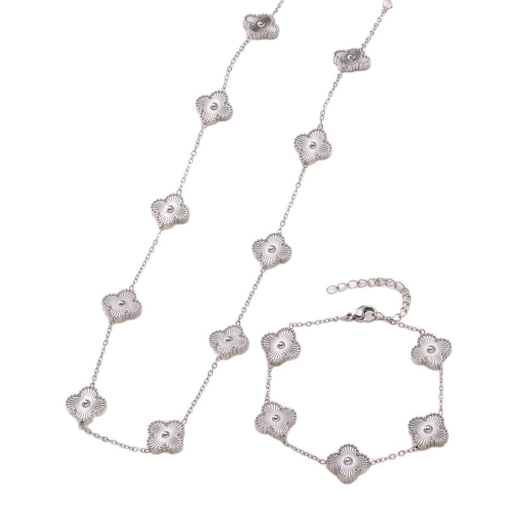 Elegant Four-Leaf Clover Jewelry Set: Titanium Steel Necklace, Earrings, and Bracelet - Light Luxury Design