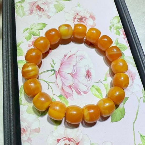 

Imitation Beeswax Bracelet with White Flower Honey, Chicken Fat Yellow, Caramel, Orange Peel Beads for Men & Women.