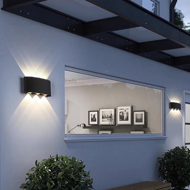 LED Outdoor Four-Leaf Clover Wall Light - Up and Down Beam Decoration for Garden and Exterior Walls.