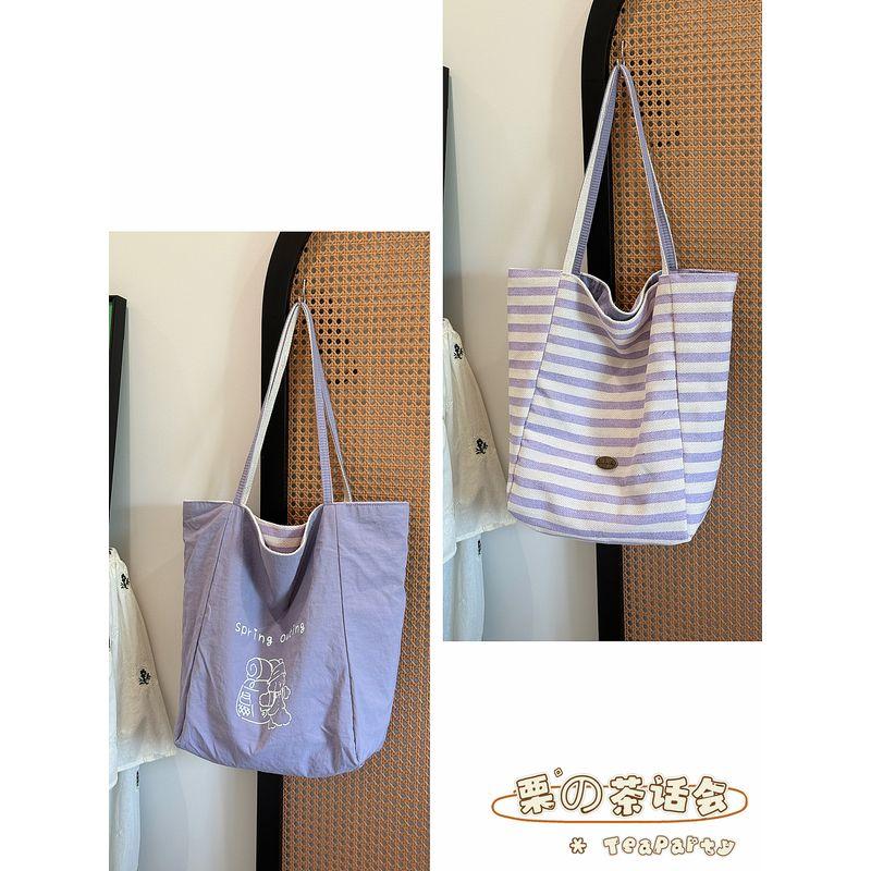 

Japan fashion Ins Style Stripe Canvas Bag Tote Bag Student Large Capacity Handbag Casual Commuter Shoulder Bag Women Purple Stripes double-sided back