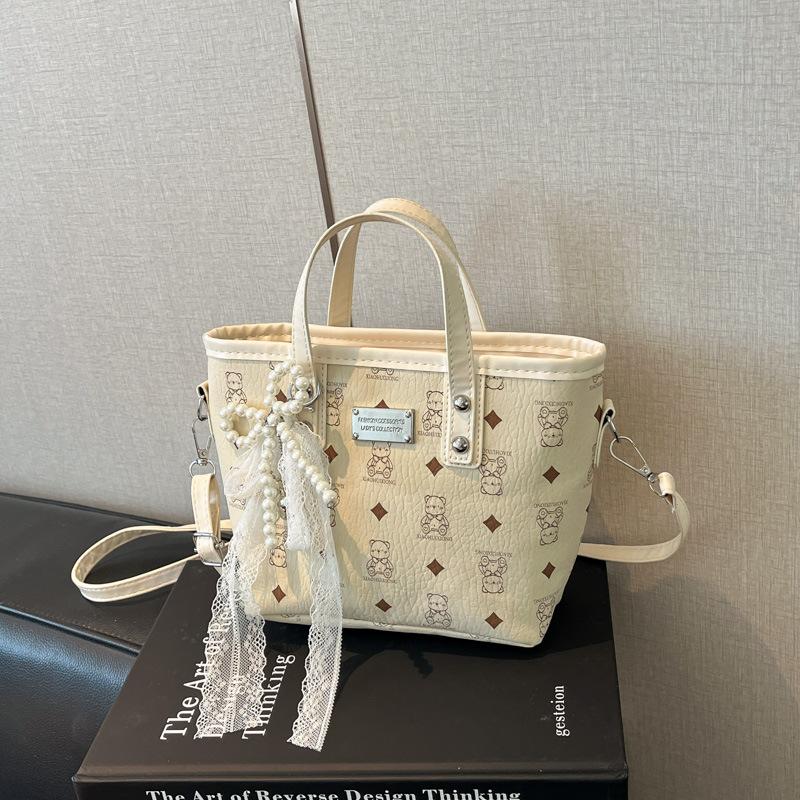 

High-end small bag women s new niche texture portable bucket bag versatile vegetable basket single shoulder messenger bag Without pendant бежевый