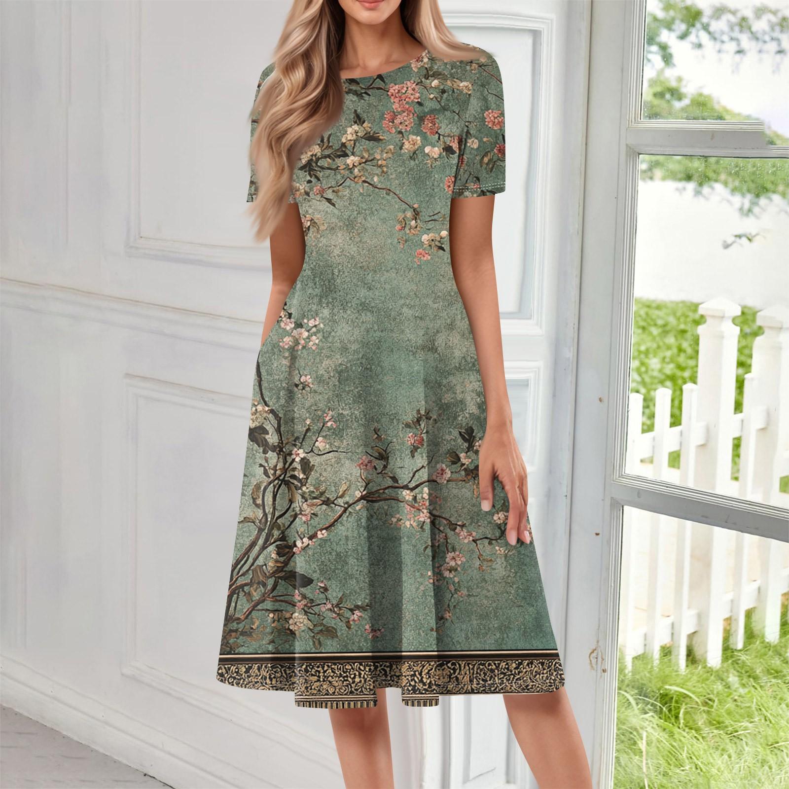 

Жіноча вільна повсякденна та модна сукня середньої довжини з круглим вирізом і короткими рукавами з принтом M