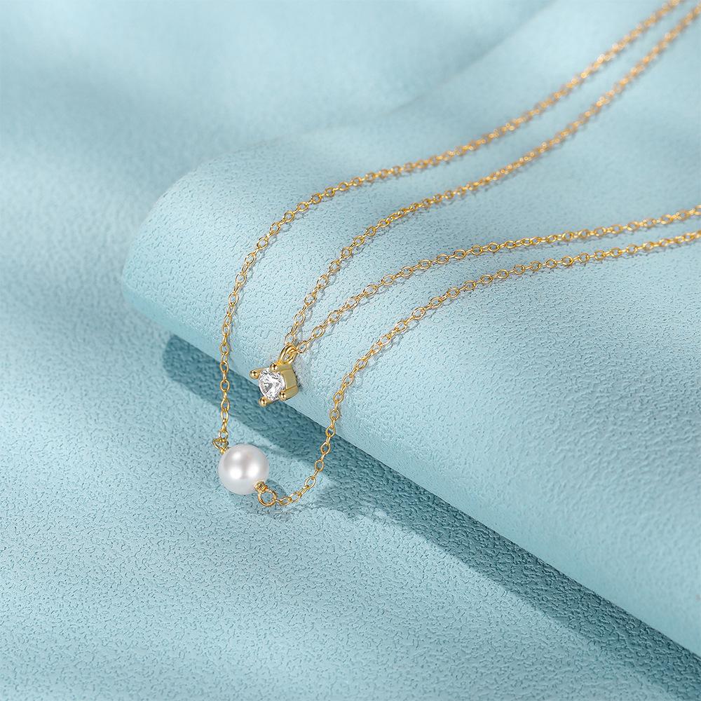 Double stacked four-claw diamond bead pearl necklace European and American hot-selling versatile ins wind collarbone chain