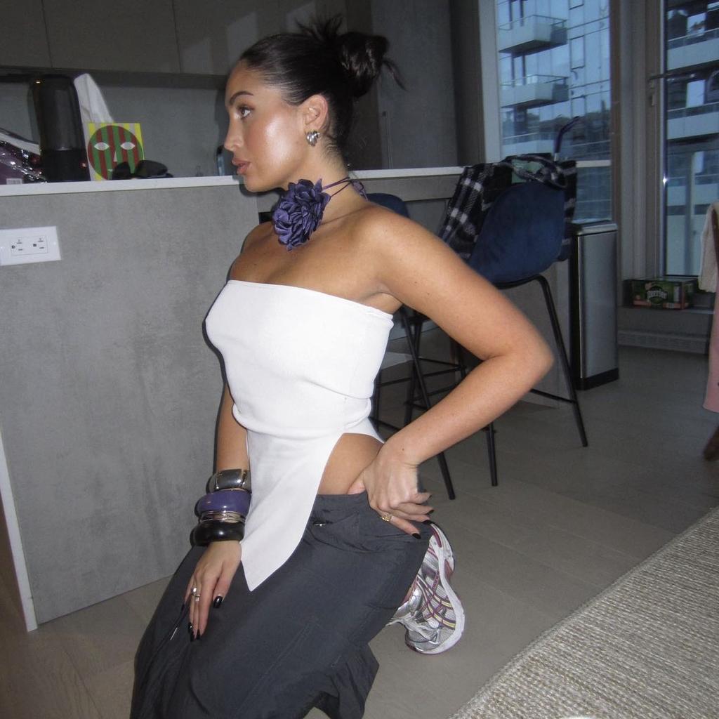 Dam oregelbunden delad ullstickad fodralvästtopp