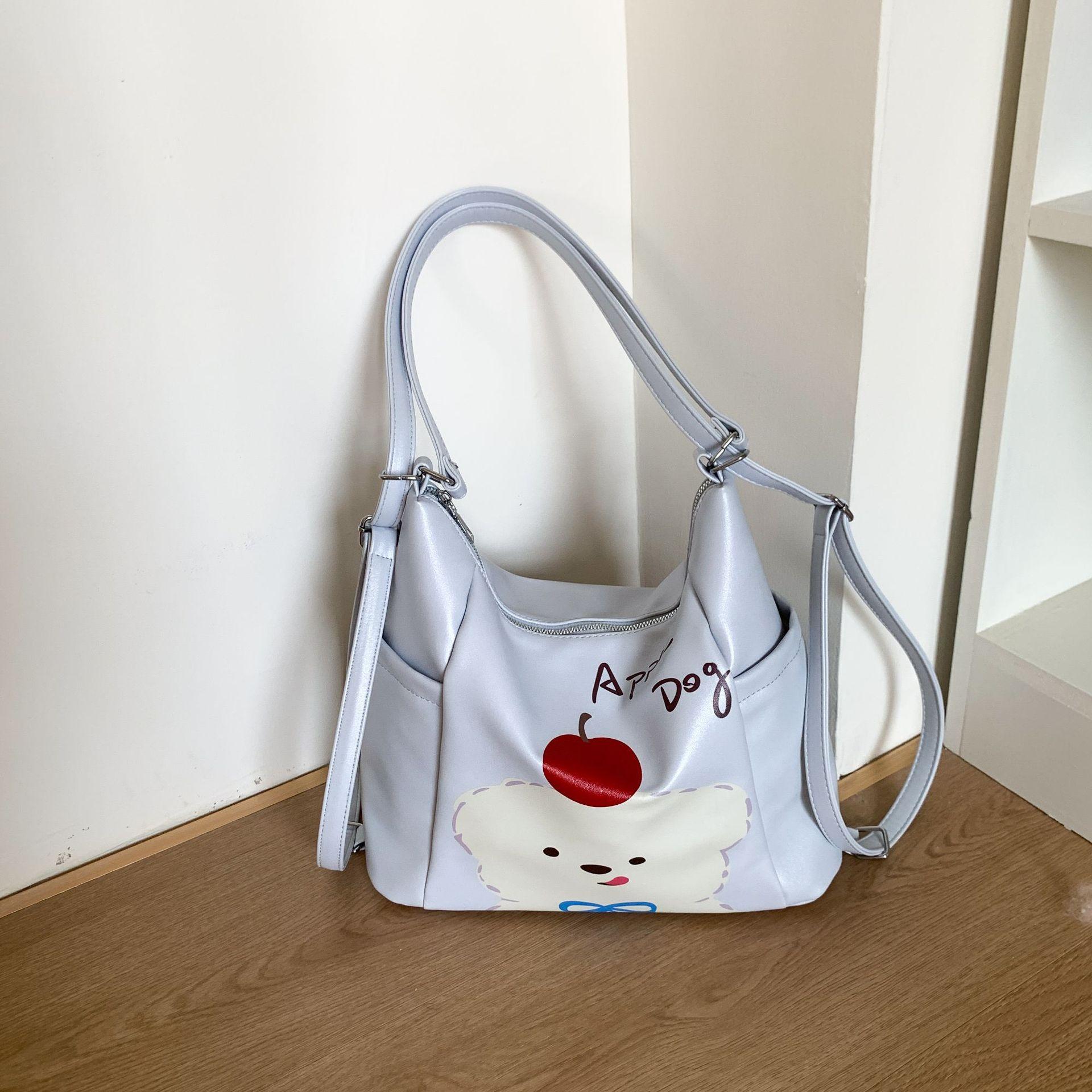 

Новая сумка-мессенджер нишевая яблочный щенок большая вместимость многоцелевая сумка-тоут маленькая свежая наплечный рюкзак синий